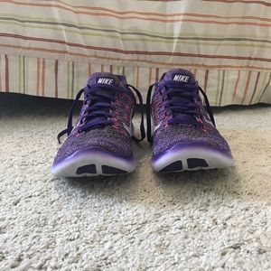 Nike flyknit purple running shoes